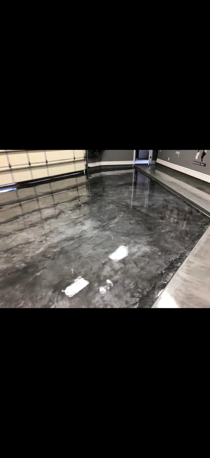 Silver metallic epoxy floor by A&J's Decorative Concrete